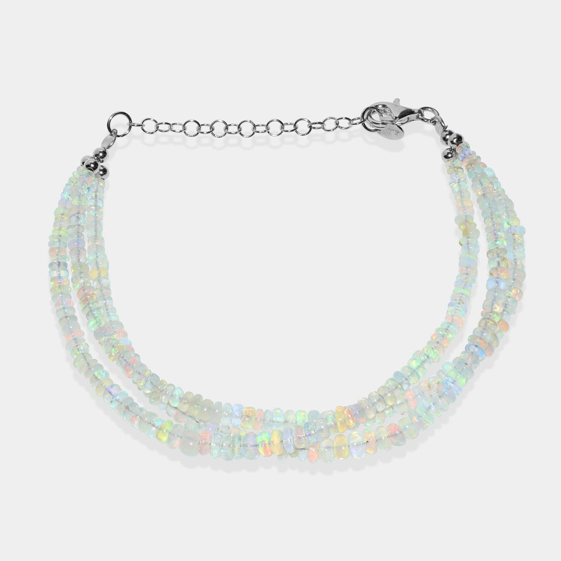 Close-Up of Smooth Rondelle Ethiopian Opals on Silver Bracelet - Fine Jewelry Detail