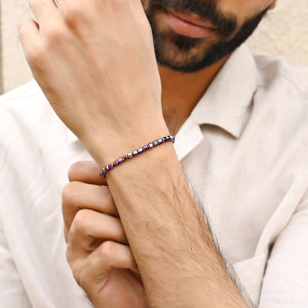 Mystic Hematite Bicone Stretch Bracelet: Smooth 4mm bicone beads in captivating hematite hue