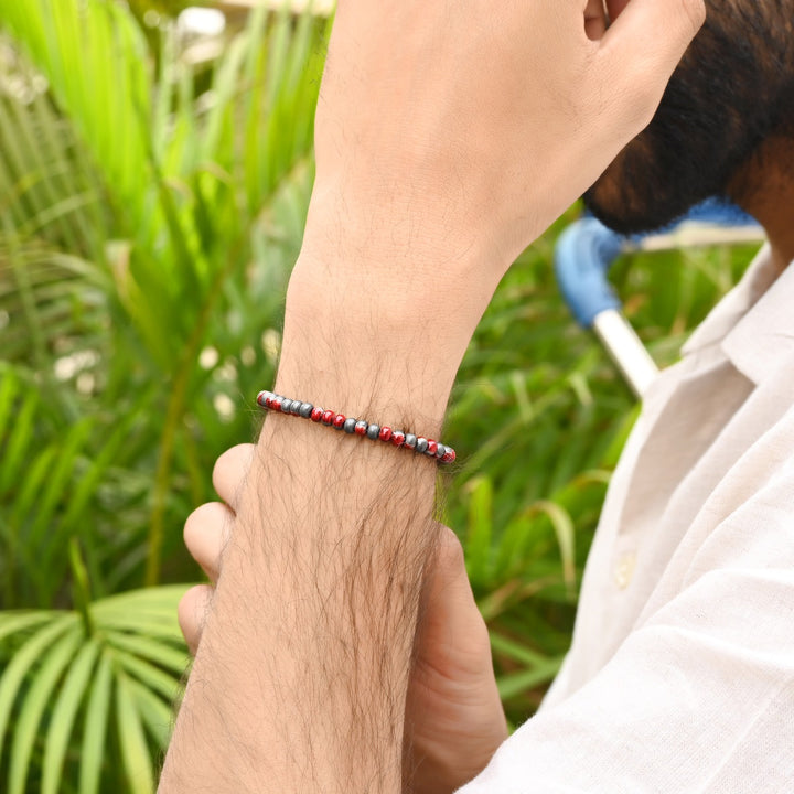 Red Gray Hematite Stretch Rondelle Bracelet: Smooth 4mm beads in dynamic red and gray hues