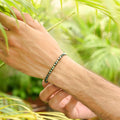 Tranquil Green Hematite Star Cut Stretch Bracelet: Smooth 4mm star cut beads in refreshing green hue