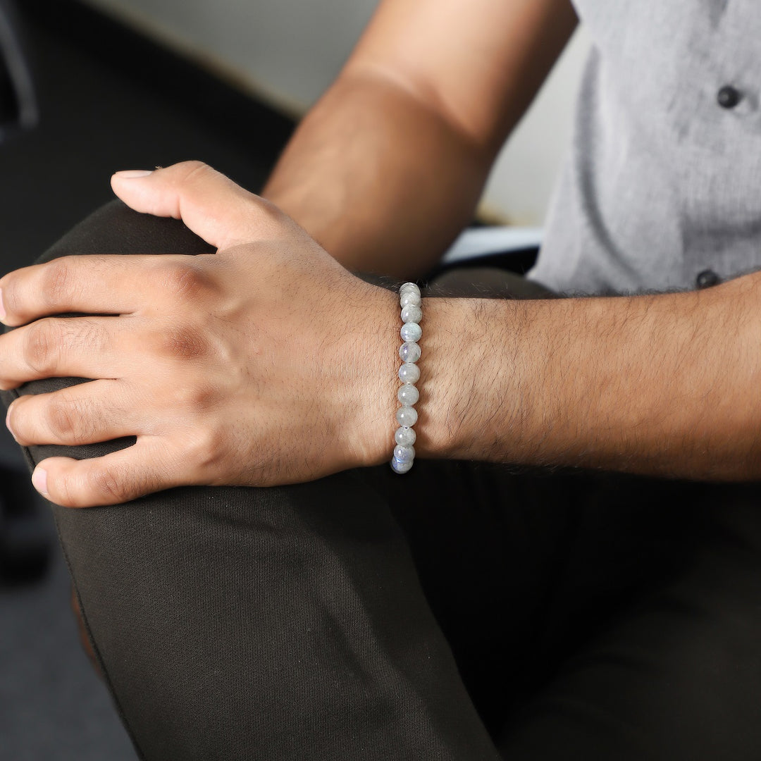 A dynamic image capturing the iridescent play of colors within a labradorite gemstone bead, showcasing its unique visual appeal.