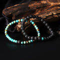 Artistic close-up of the Natural Turquoise & Lava Gemstone Bracelet. A captivating shot capturing the vibrant turquoise hues and the raw elegance of lava gemstones, creating a unique and eye-catching composition.