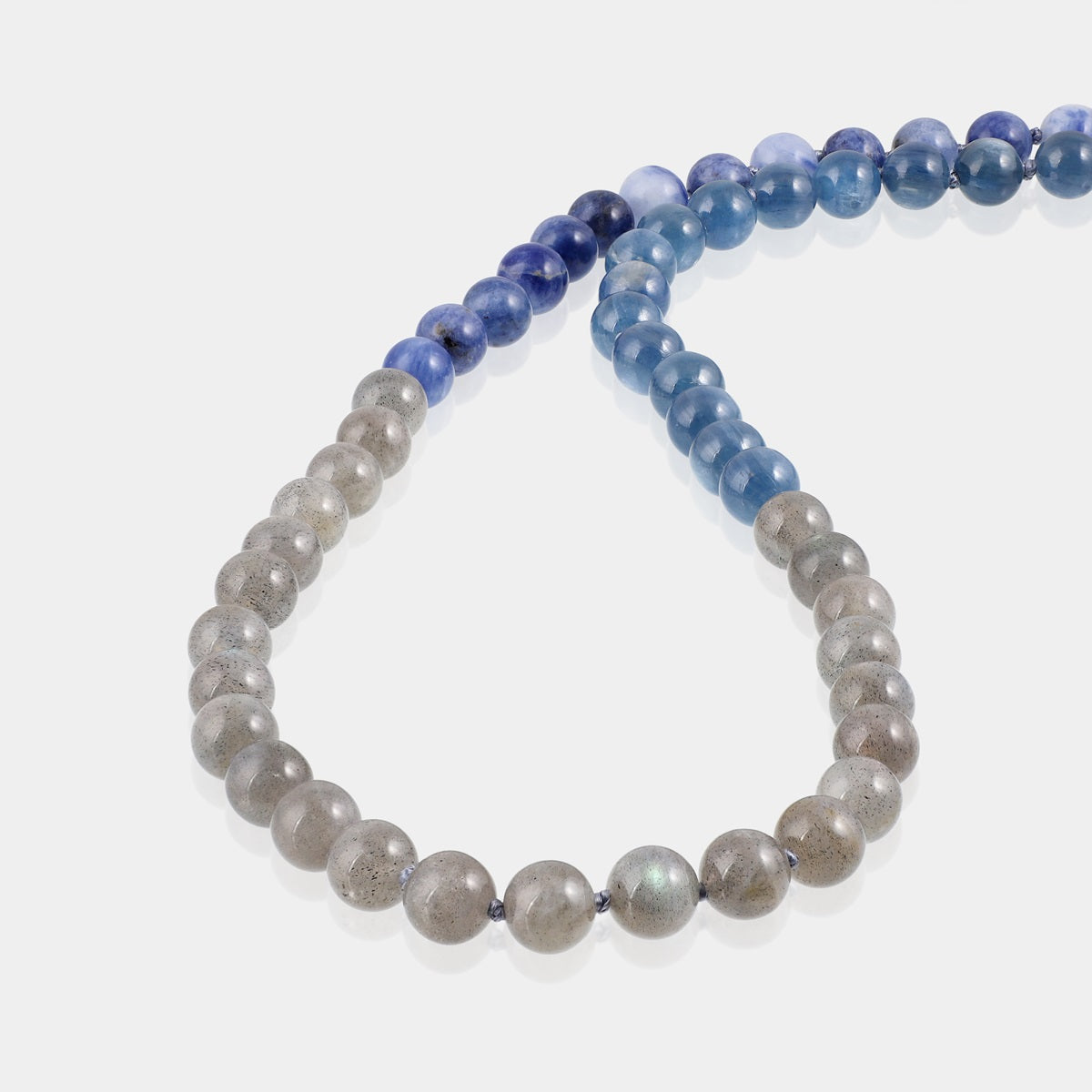 handcrafted spiritual accessories featuring Labradorite, Kyanite, and Sodalite gemstones, designed to elevate your meditation experience.