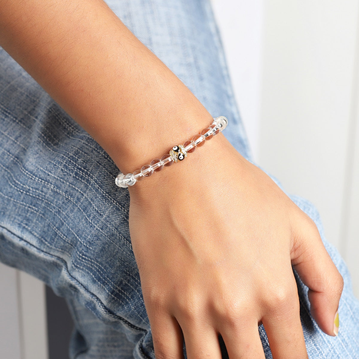 Model Wearing Crystal Quartz Stretchable Bracelet - Gemstone Benefits