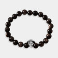 Silver and Black Gemstone Bracelet with Protective Skull Charm