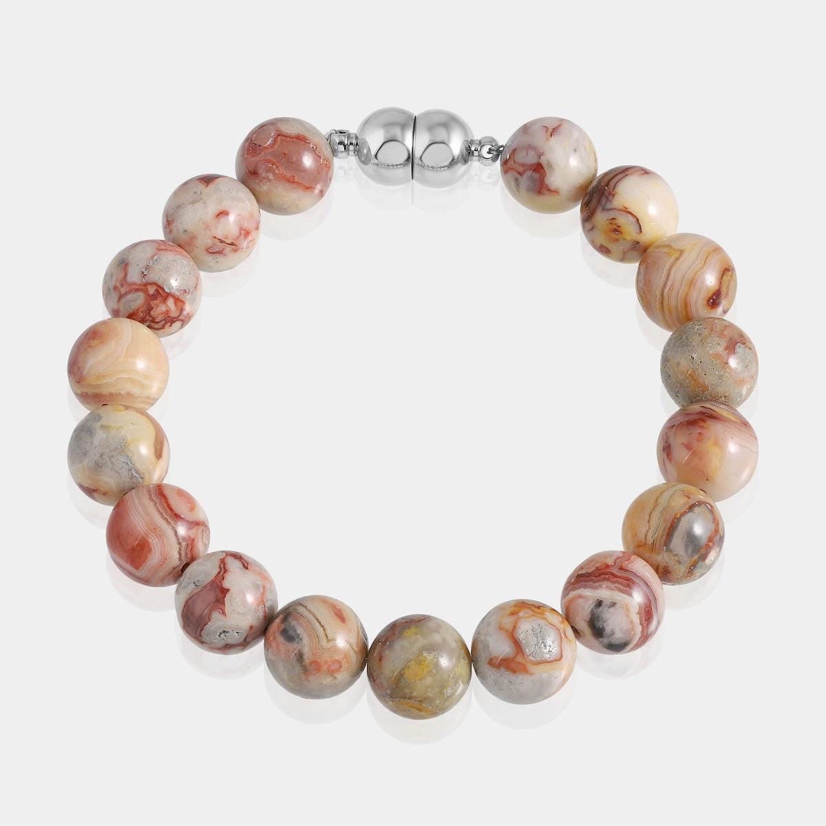 A detailed shot of the magnetic lock mechanism on the crazy lace agate gemstone bracelet, highlighting the brass accents and the convenient clasp.