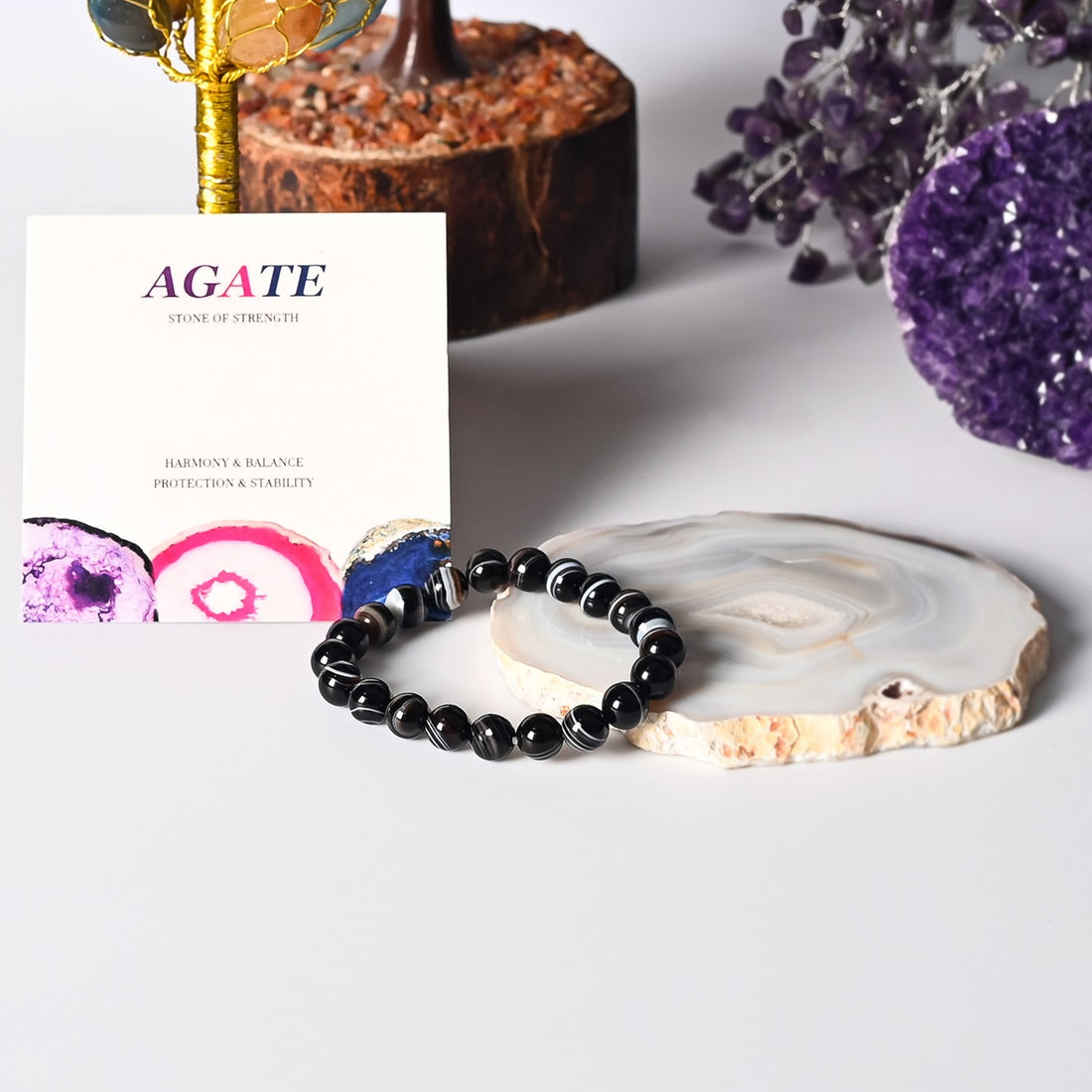 Stylish Black Banded Agate 8mm Round Beads Stretch Bracelet adorning the wrist, a fashionable accessory for strength and grounding