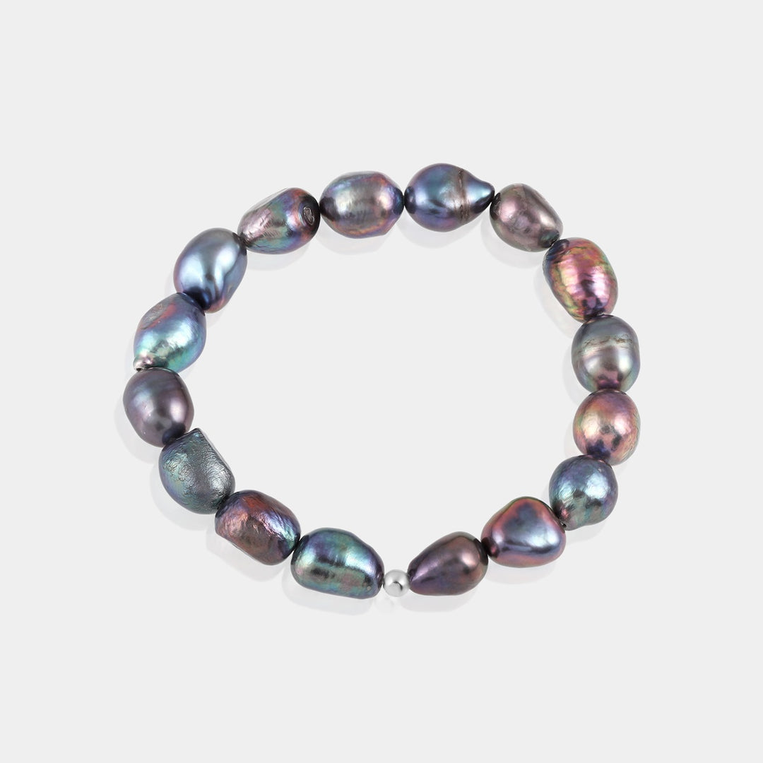 Array of Smooth Tumble Pearls, showcasing Elegant Black Hue