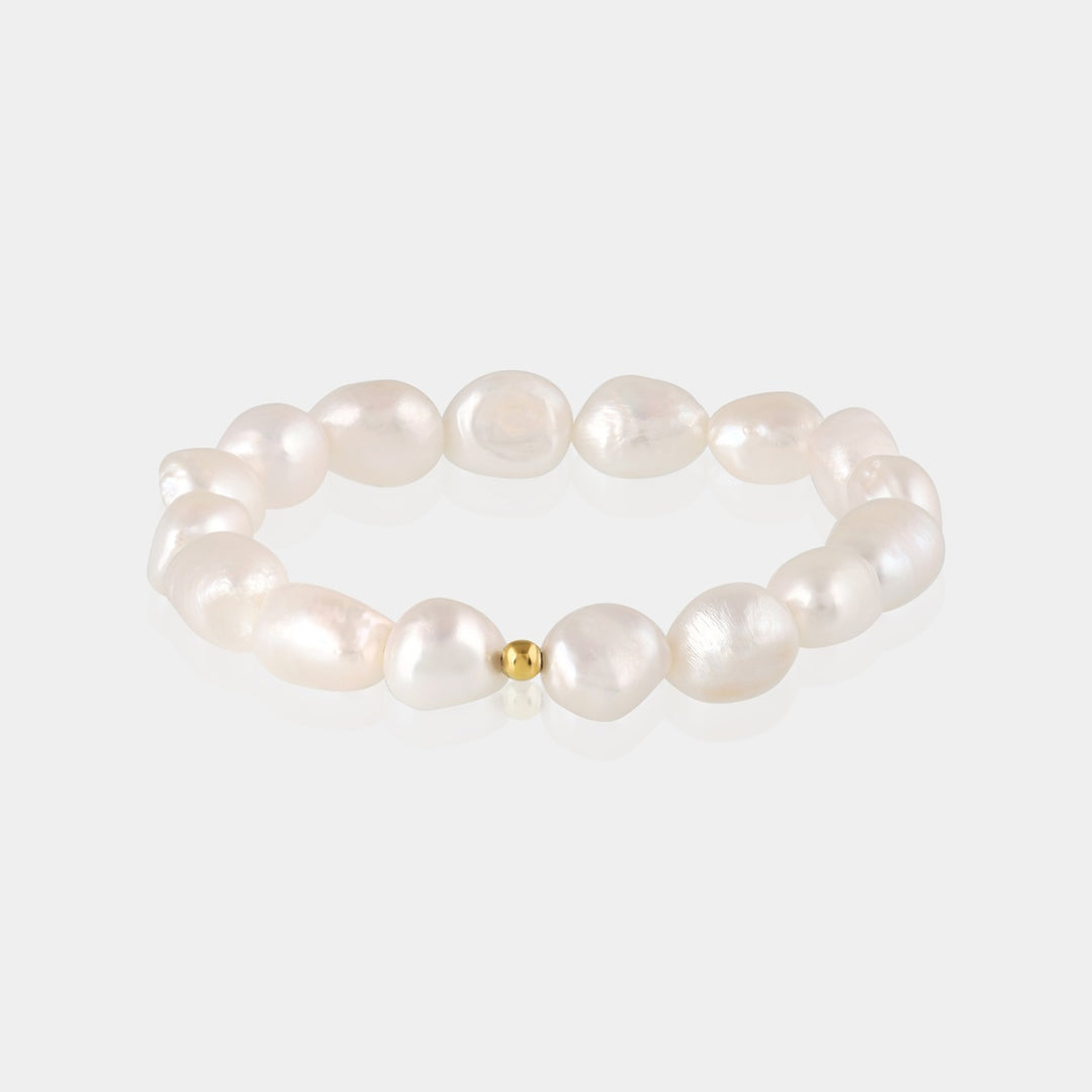 Array of Smooth Tumble Pearls, showcasing Classic White Hue