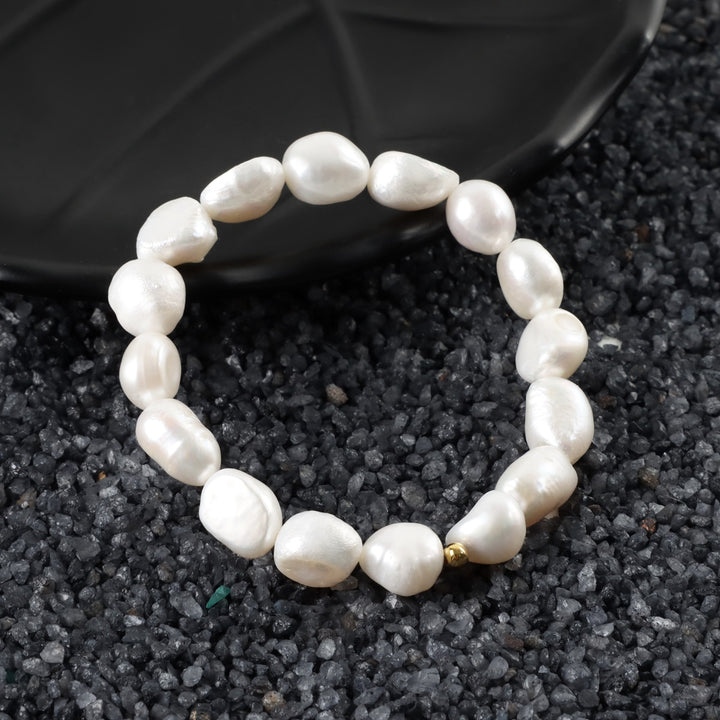 Close-up of White Baroque Pearl in Handmade Stretch Bracelet