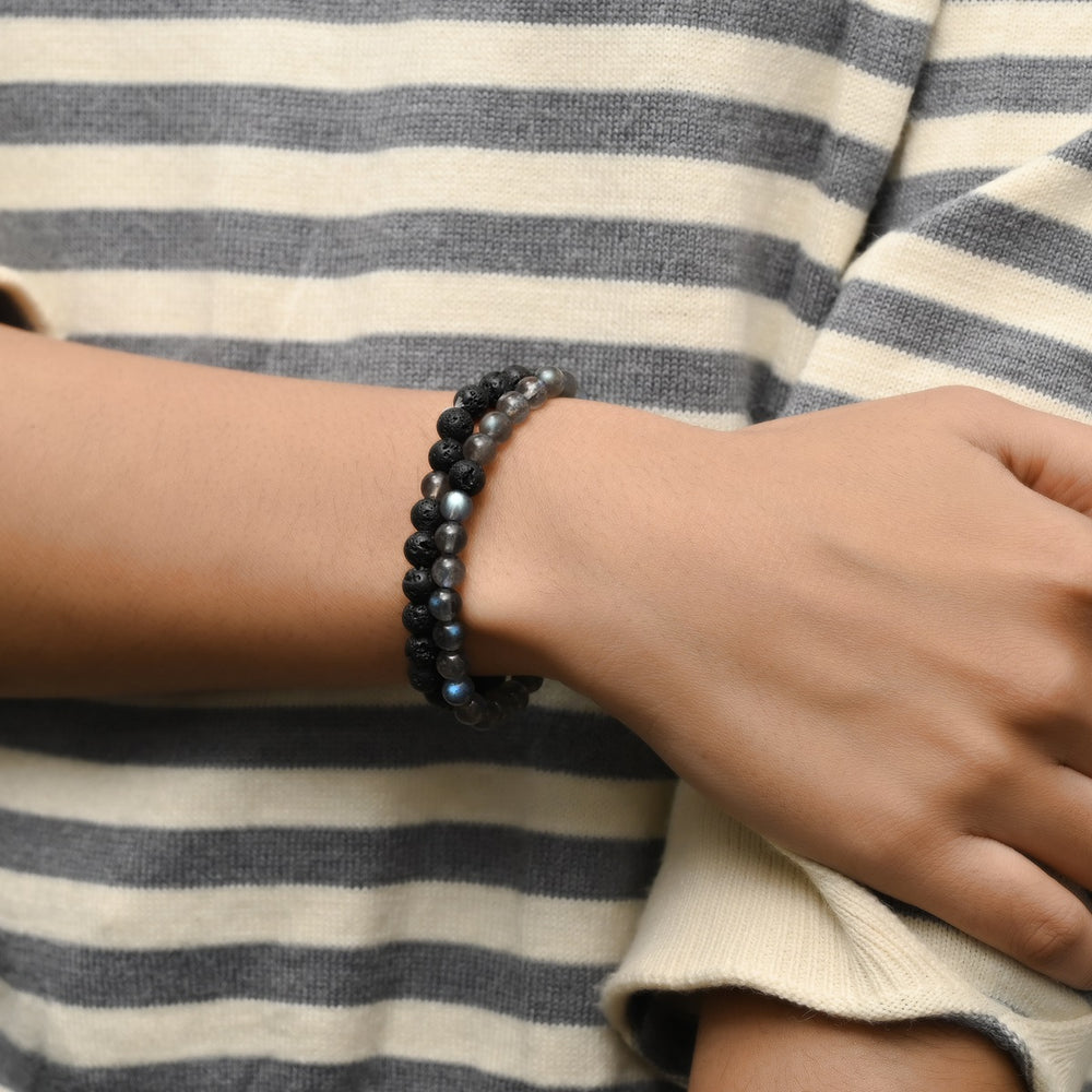 Elegant Labradorite and Lava gemstone bracelet gracefully adorning the wrist, blending fashion with healing energy.