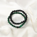 Detailed close-up showcasing the intricate beauty of green Malachite and black Lava gemstones in our exquisite bracelet.