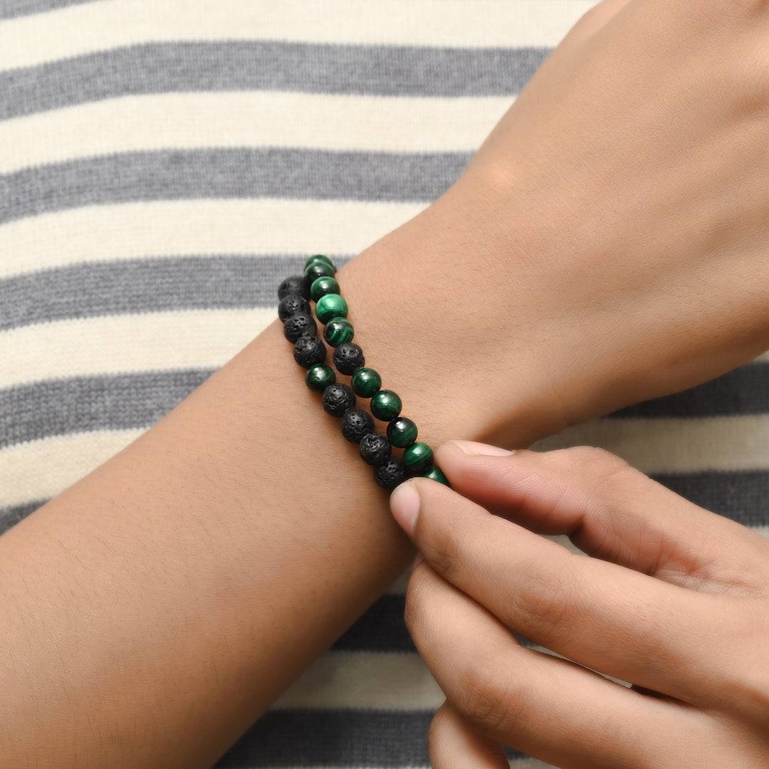 Elegant Malachite and Lava gemstone bracelet gracefully adorning the wrist, blending fashion with the positive energy of natural stones