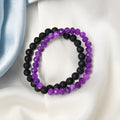 Detailed close-up showcasing the intricate beauty of Purple Quartz's faceted rondelle beads and the contrasting black Lava gemstones