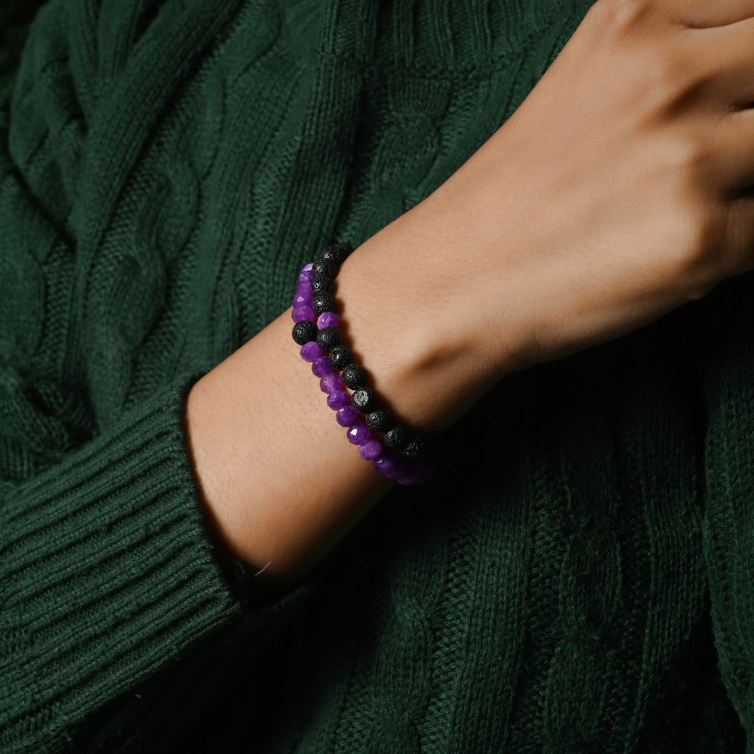 Elegant Purple Quartz and Lava gemstone bracelet adorning the wrist, a harmonious blend of style and healing energies.