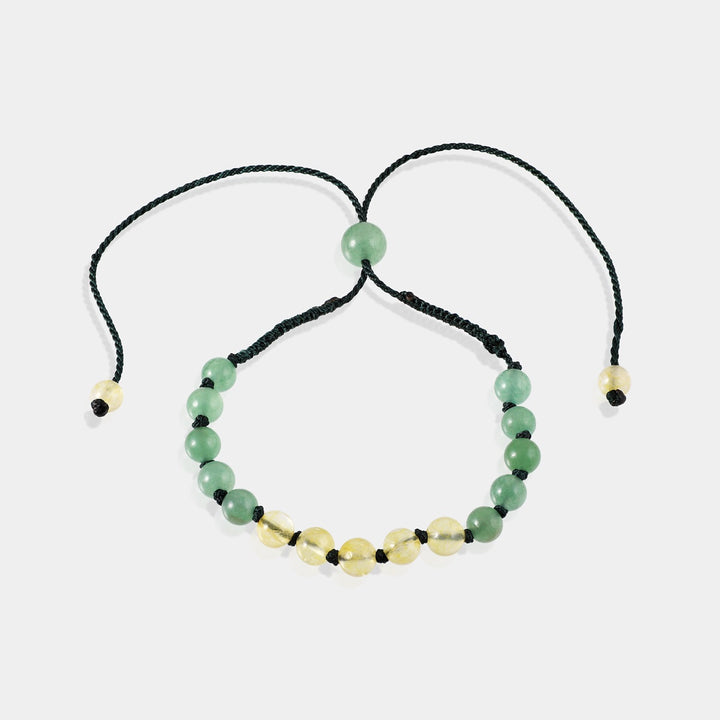 Detailed shot showcasing 6 mm smooth round Green Aventurine gemstone beads, representing luck, confidence, and overall well-being