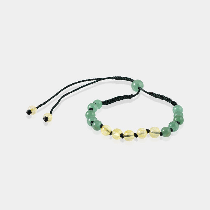 Vibrant image highlighting 8 mm smooth round Green Aventurine gemstone beads, adding a touch of prosperity and emotional balance to the bracelet