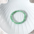Stunning shot of the Green Aventurine Bracelet in natural light, highlighting its beauty and the prosperity-attracting qualities