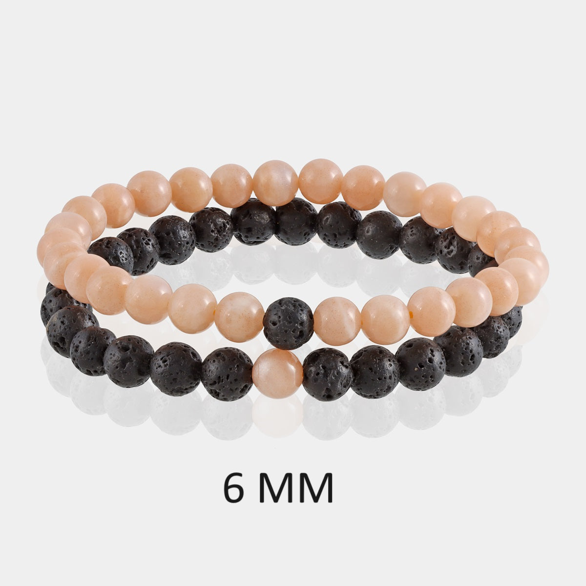 Detailed view of a 6mm Peach Moonstone bead, showcasing the exquisite craftsmanship and soothing peach hue in the bracelet combo