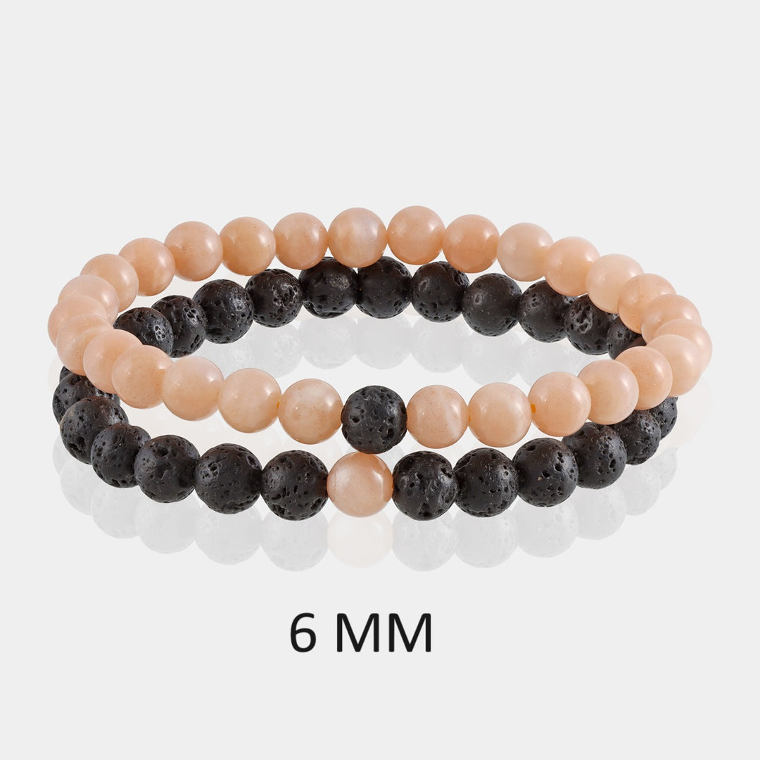 Stylish Peach Moonstone and Lava Bracelet featuring 6mm beads, a harmonious fusion of elegance, emotional healing, and grounding energy on the wrist