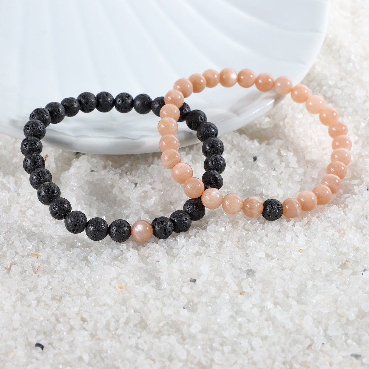 Various styling ideas for the Peach Moonstone and Lava Bracelet Combo, showcasing its versatile and fashionable appeal for everyday wear.