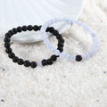 Visual representation of harmonious energy associated with the Blue Lace Agate and Lava Gemstone Bracelet Combo, combining elegance and grounding strength