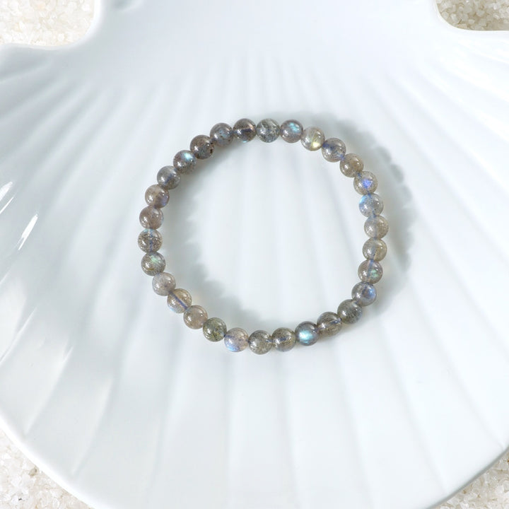Various styling ideas for the Labradorite Stretch Bracelet, showcasing its versatile and fashionable appeal for everyday wear