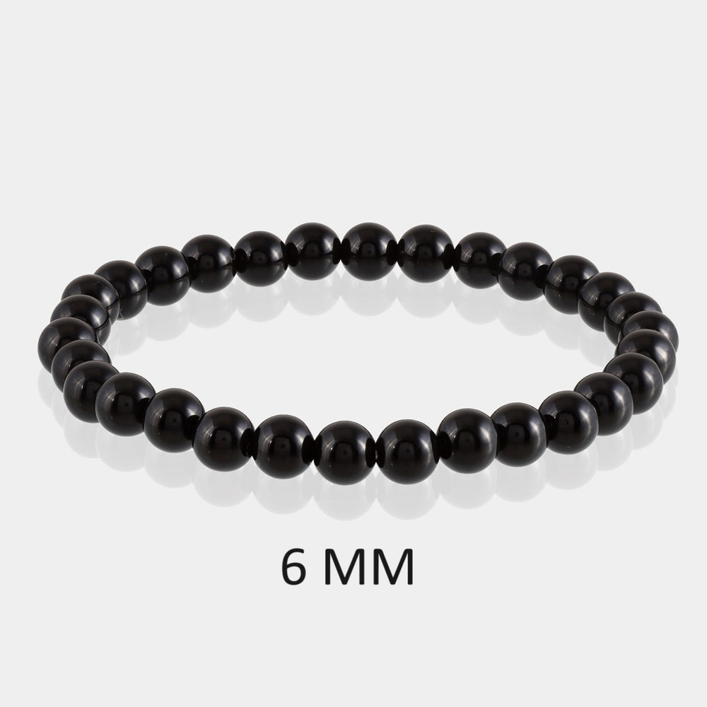 Detailed view of 6mm Black Tourmaline beads, showcasing the deep black color and exquisite craftsmanship in the bracelet.