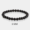 Detailed view of the smooth round Black Onyx stones in the bracelet, showcasing their natural beauty and texture