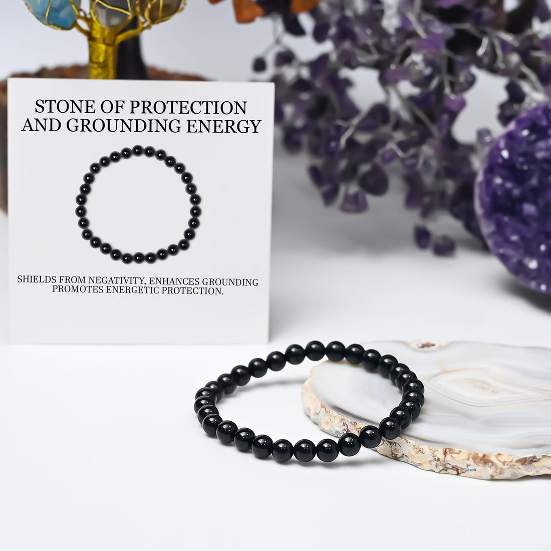Symbolic image representing the protective qualities of Black Tourmaline, shielding against negativity, portrayed elegantly in the bracelet