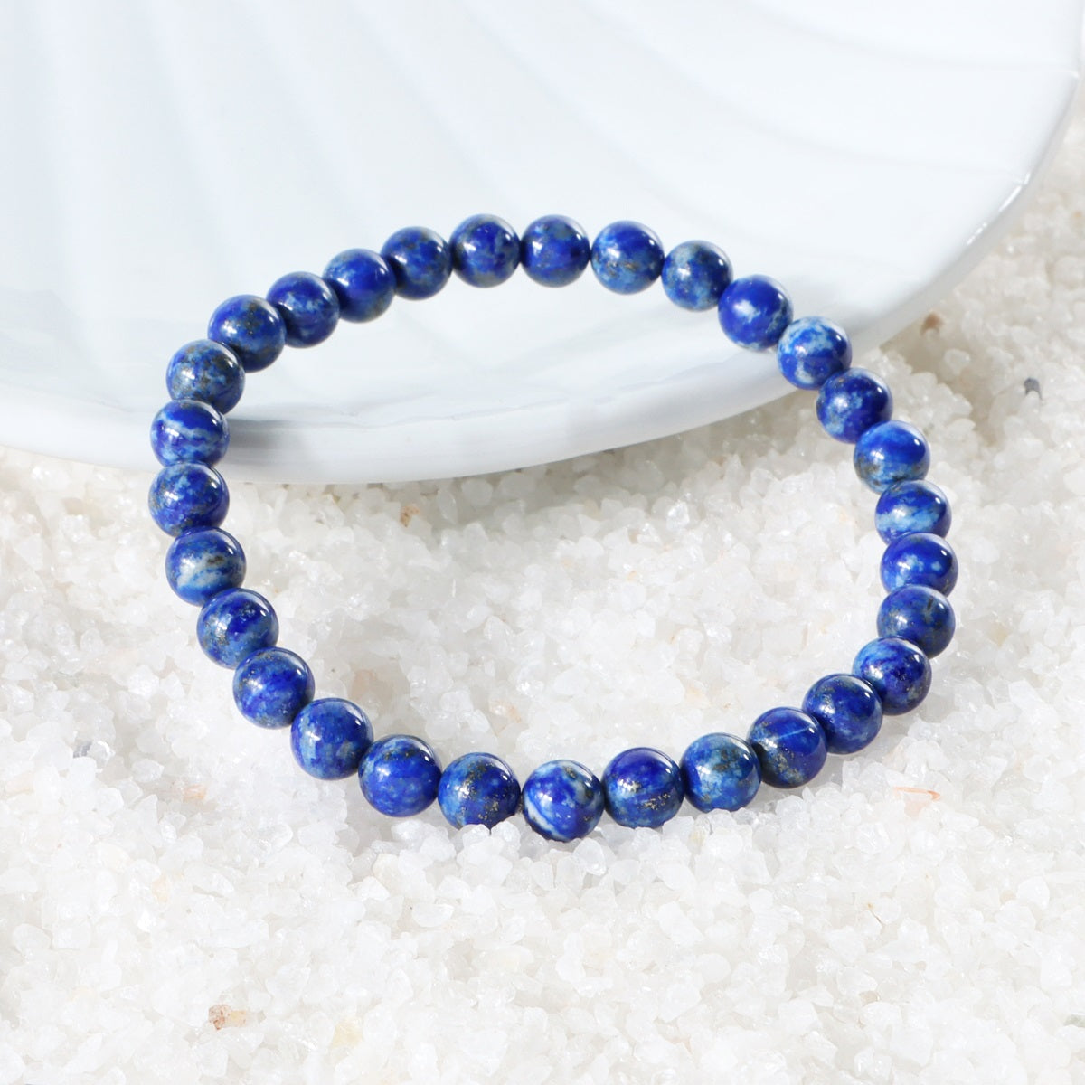 Various styling ideas for the Lapis Lazuli Stretch Bracelet, showcasing its versatile and fashionable appeal for everyday wear