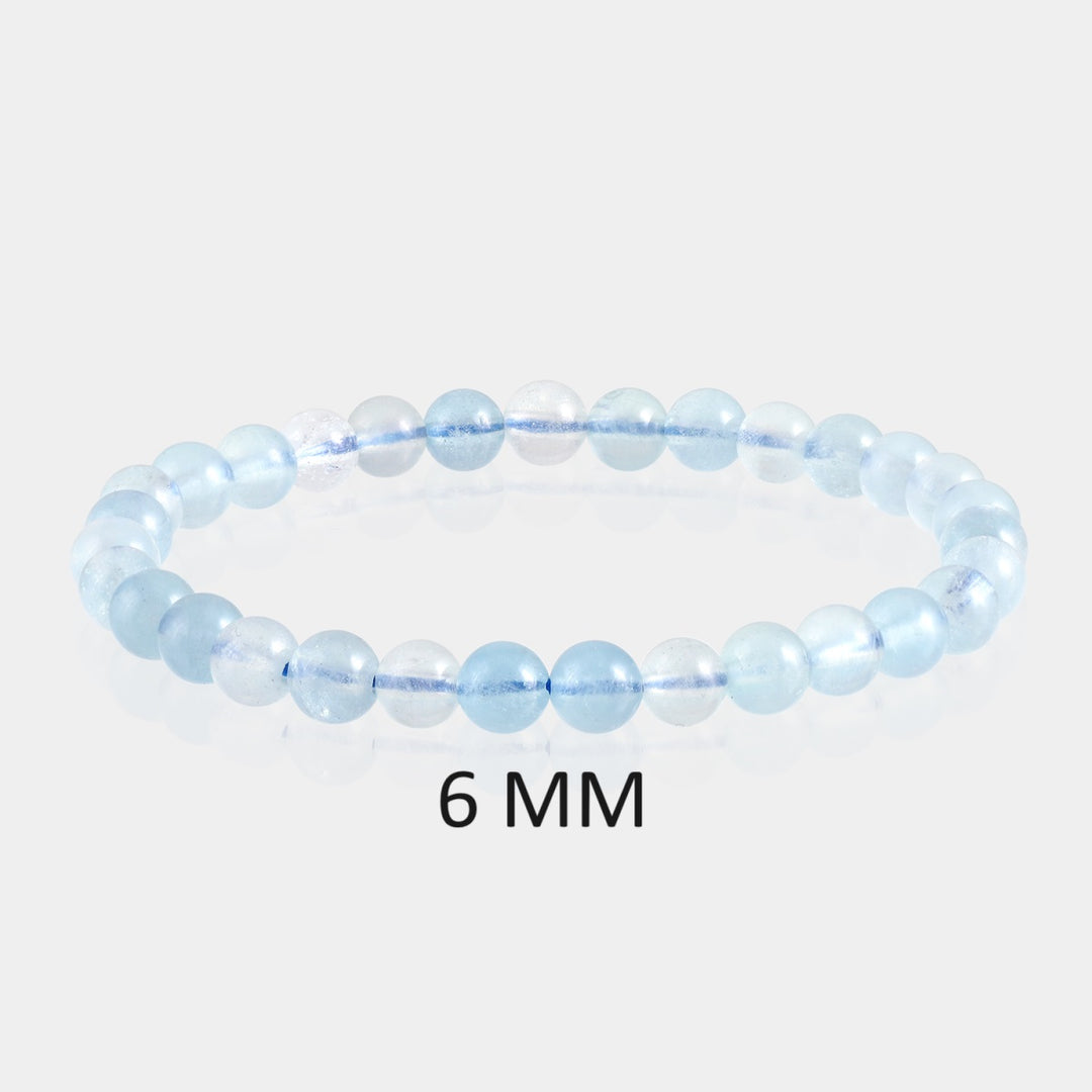 Detailed view showcasing the exquisite 6mm and 8mm smooth round Aquamarine beads, highlighting their tranquil blue hues