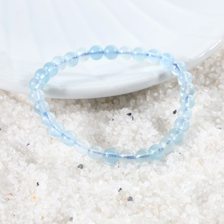 Lifestyle image showcasing the Aquamarine Bracelet being worn, blending seamlessly with daily fashion and empowering the wearer