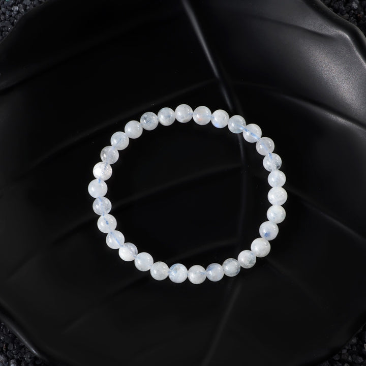 Visual representation of new beginnings associated with the Rainbow Moonstone Stretch Bracelet, radiating positive energy during transitional phases