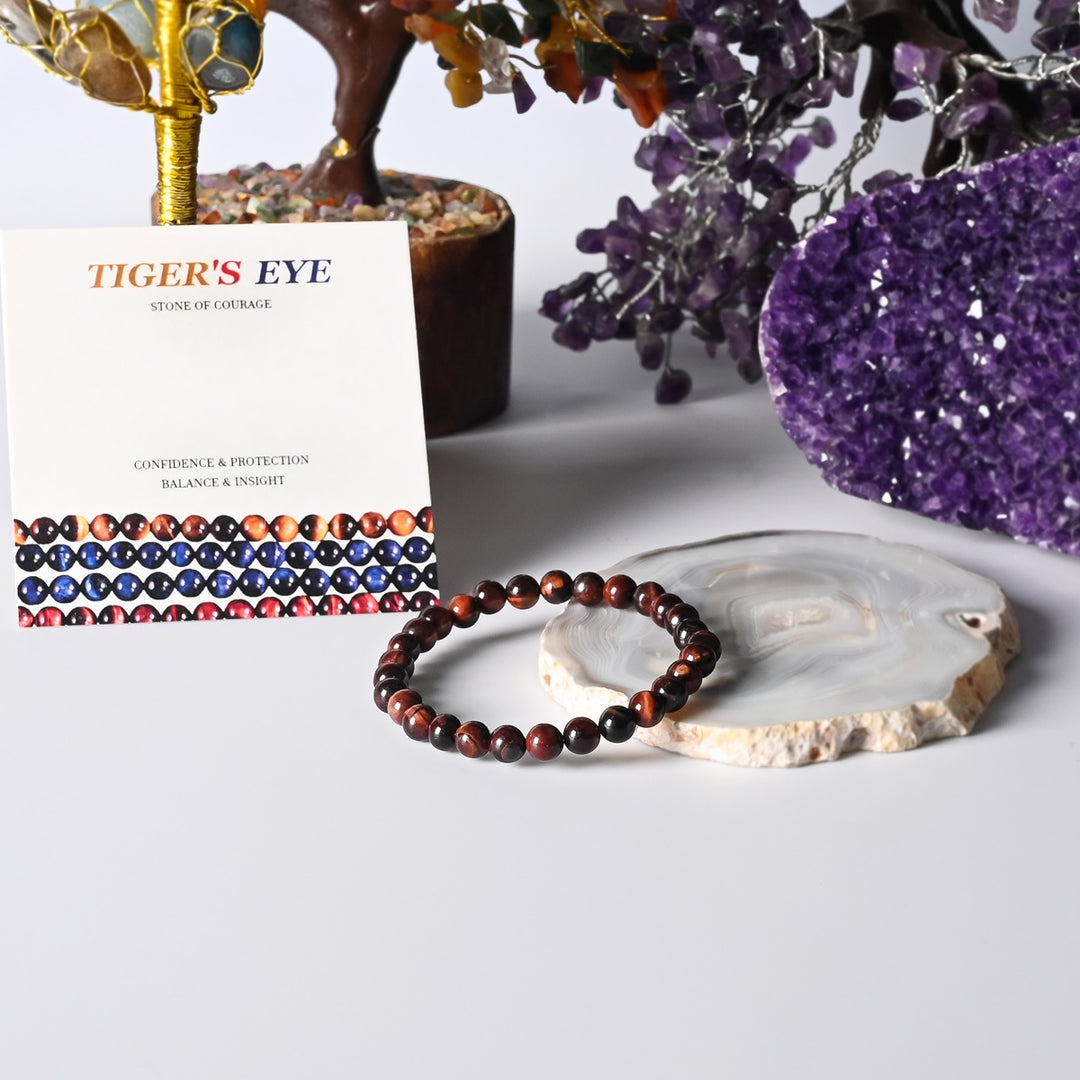Artistic representation symbolizing courage, featuring the Red Tiger's Eye Bracelet as a source of empowerment and strength for a fearless attitude