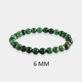 Detailed view of a 6mm Jade bead, showcasing the varied shades of green and exquisite craftsmanship in the bracelet