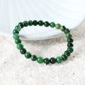Various styling ideas for the Jade Stretch Bracelet, showcasing its versatile and fashionable appeal for everyday wear