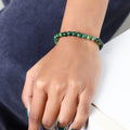 Stylish Jade Stretch Bracelet featuring 6mm beads, a symbol of harmony and prosperity, elegantly adorning the wrist