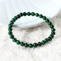Symbolic image representing emotional healing linked to Malachite, fostering emotional well-being and releasing negative patterns