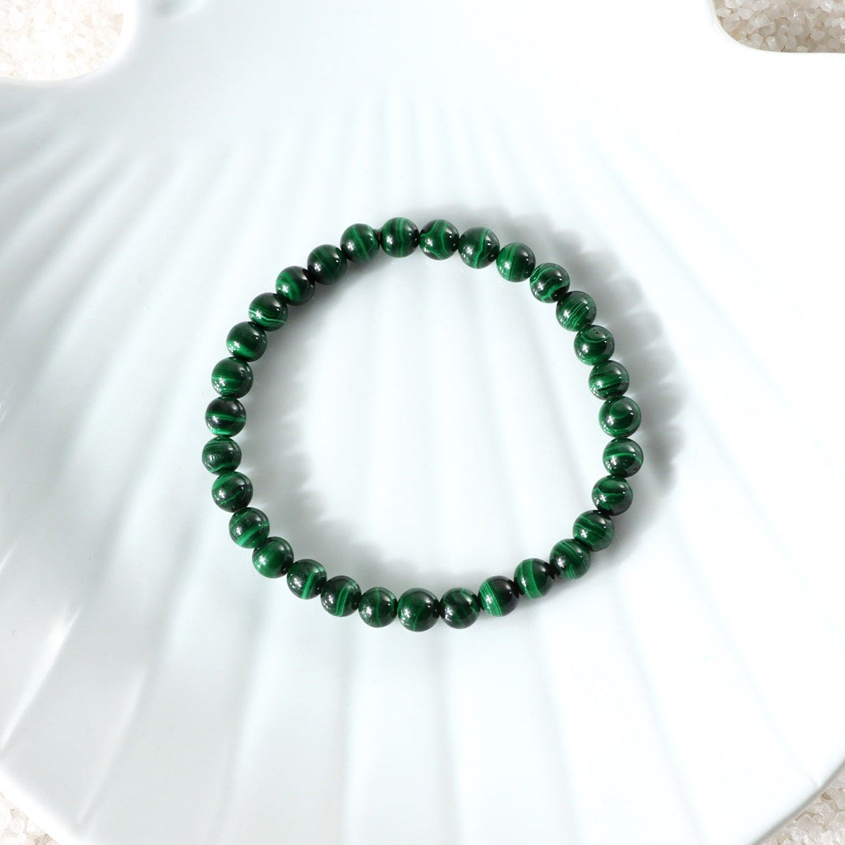 Various styling ideas for the Malachite Stretch Bracelet, showcasing its versatile and fashionable appeal for everyday wear.