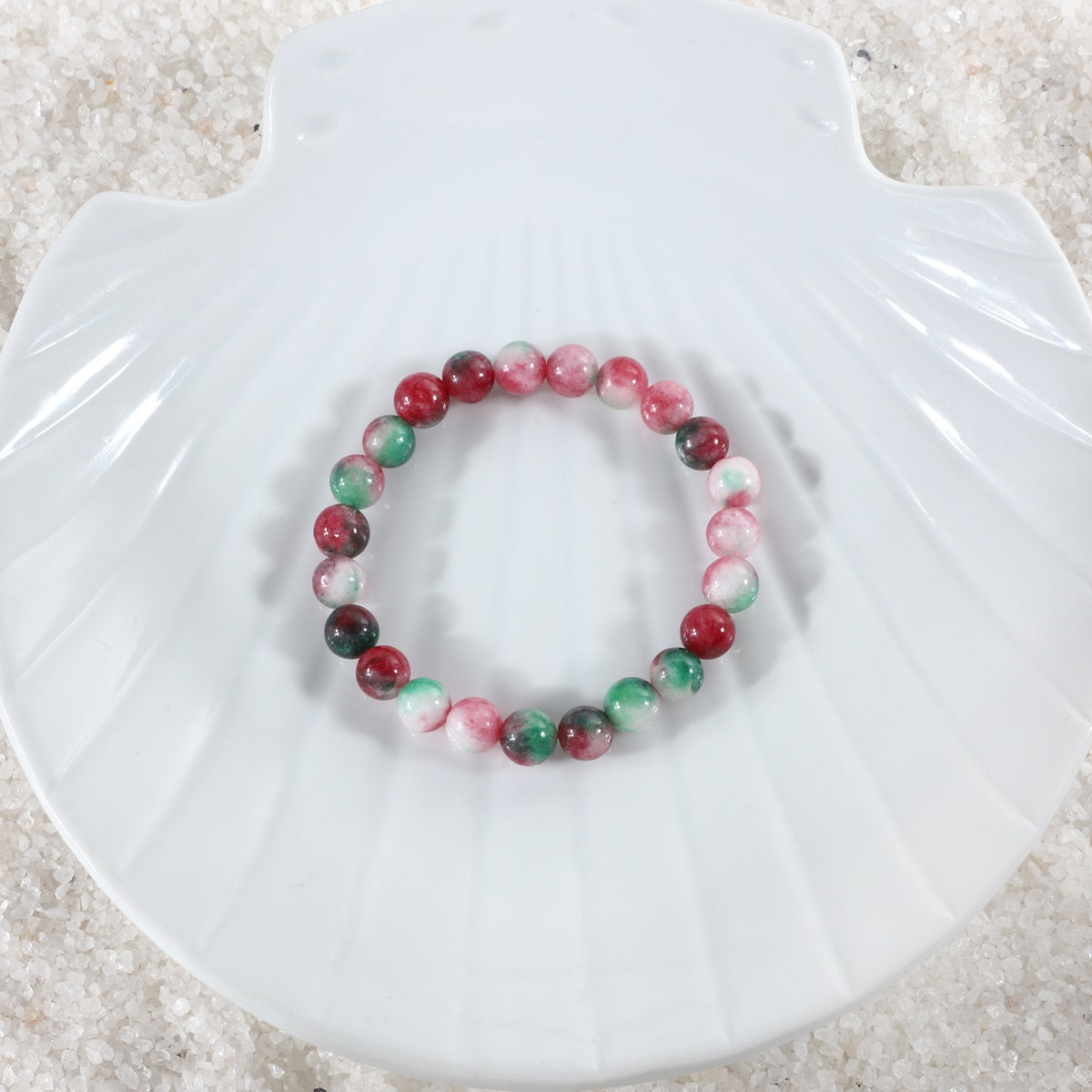 Symbolic image representing emotional healing associated with Watermelon Quartz, portraying the bracelet as a source of comfort and positive emotional energies