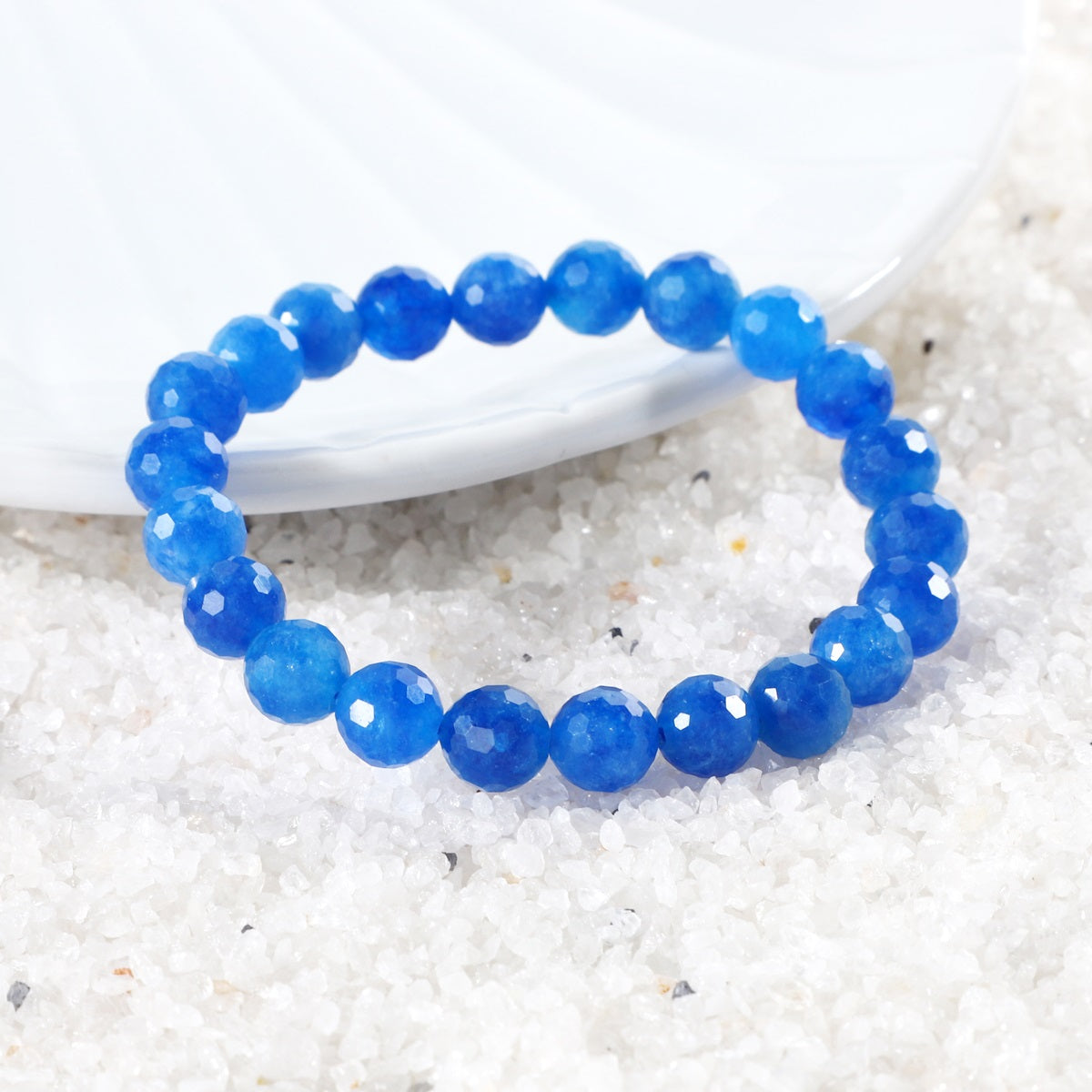 Faceted round Blue Quartz stones in the bracelet, reflecting light and adding a touch of sophistication