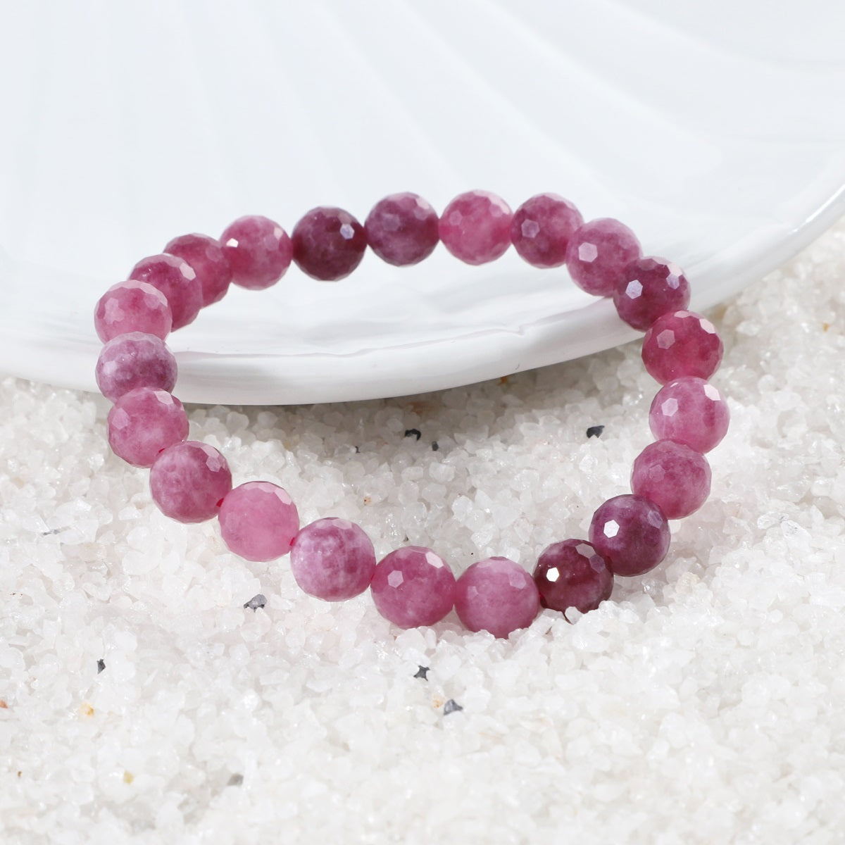 Faceted round Pink Quartz stones in the bracelet, reflecting light and adding sophistication to your ensemble