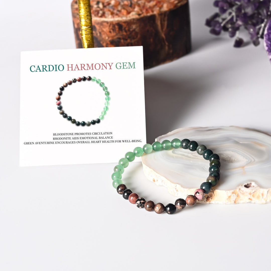 Stylish composition featuring the Heart Health Bracelet with healing gemstones