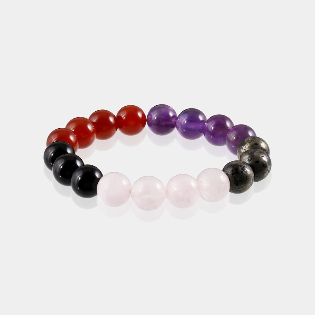 Stylish and meaningful stretch bracelet featuring Black Tourmaline, Amethyst, Rose Quartz, Carnelian, and Pyrite for protection, love, and abundance