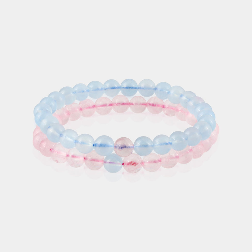 Set of Aquamarine and Rose Quartz gemstone bracelets, beautifully arranged to reflect a perfect balance of colors and positive energy.