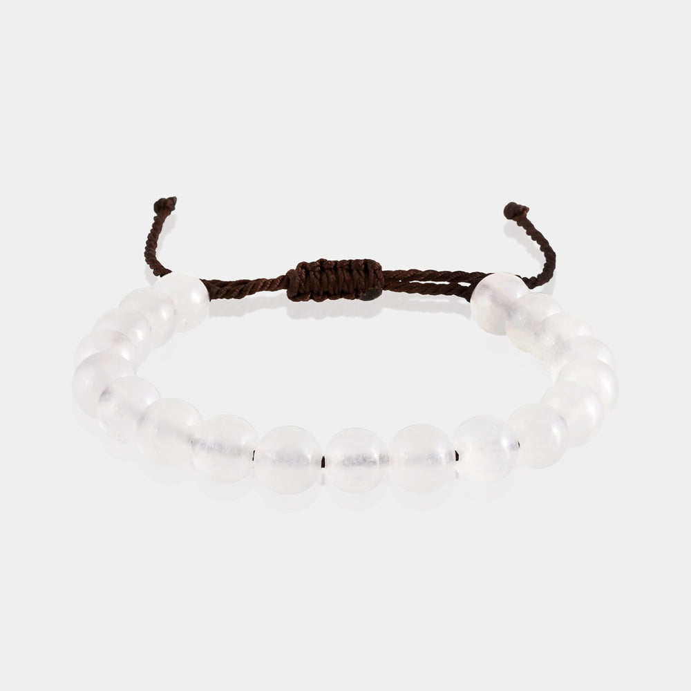 Selenite 8mm Rope-Knotted Bracelet on a neutral background