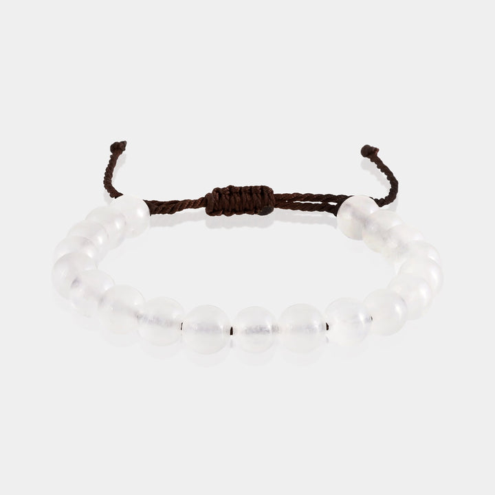 Selenite 8mm Rope-Knotted Bracelet on a neutral background