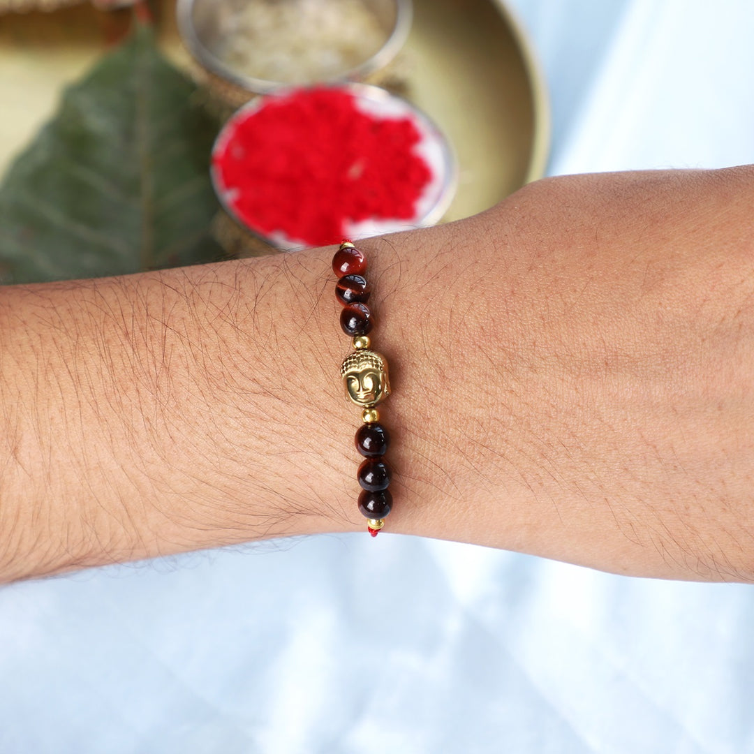 Red Tiger's Eye Hematite Buddha Rakhi - Courage & Grounding