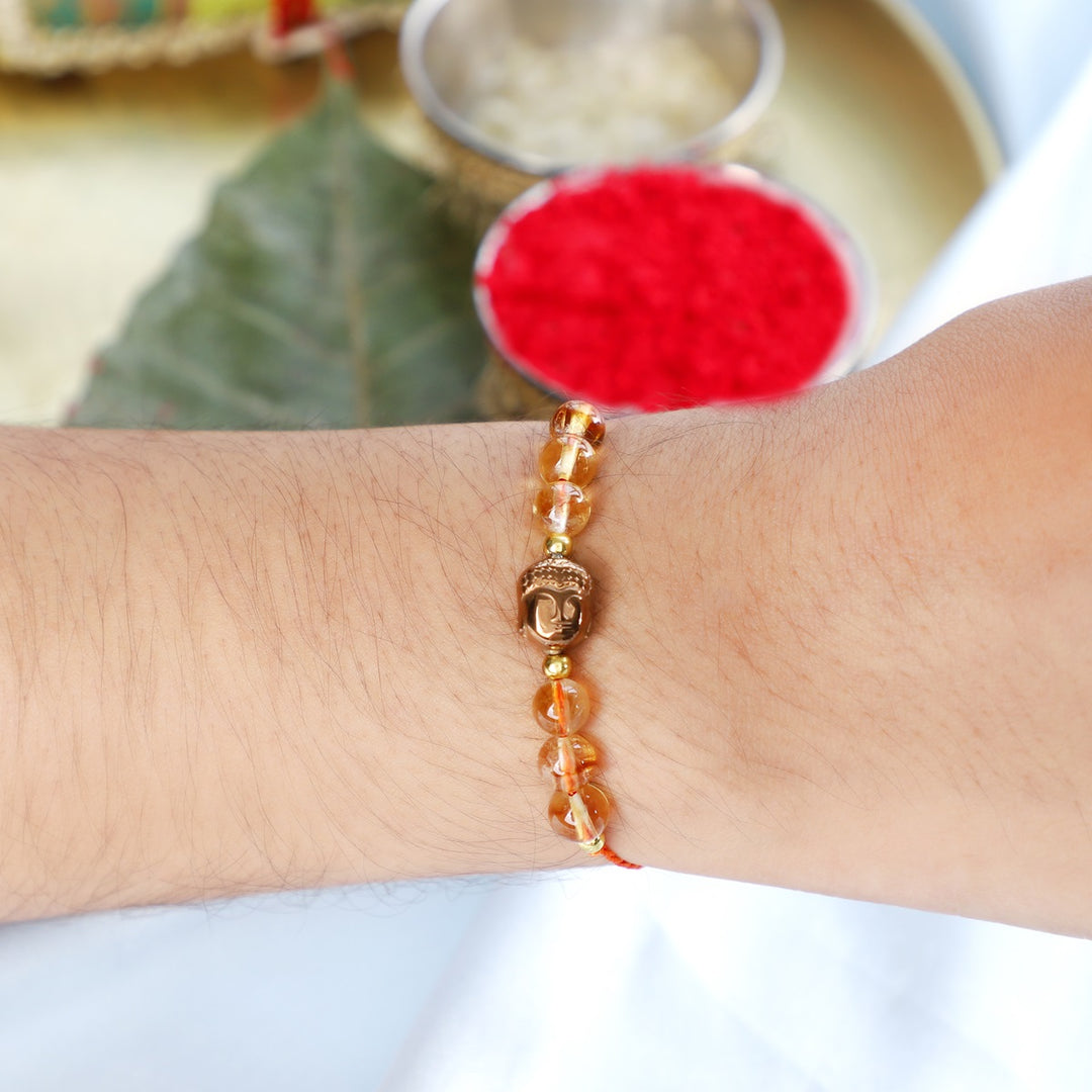 Citrine Buddha Rakhi - Abundance & Stability